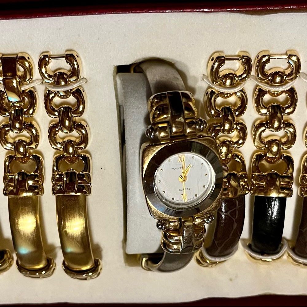 Vernier gold town quartz watch with extra bands